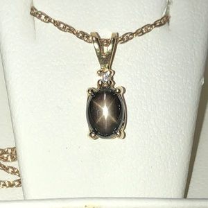 Black star sapphire and diamond, gold necklace